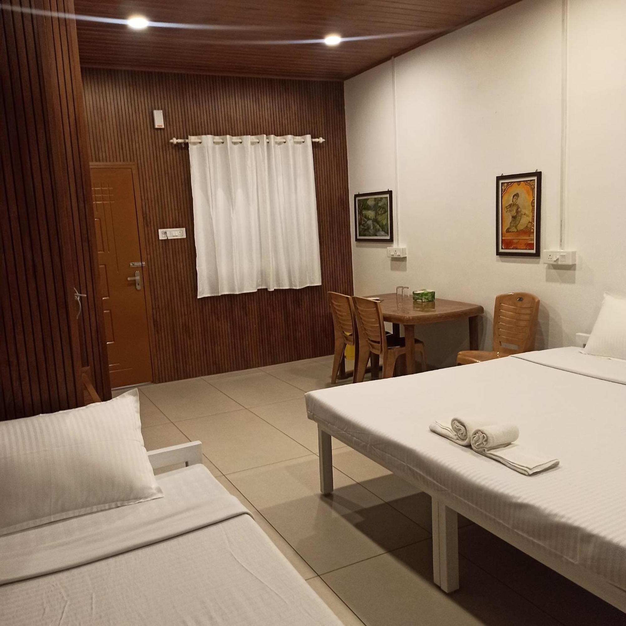 Bethesda Inn Kochi Habitación foto